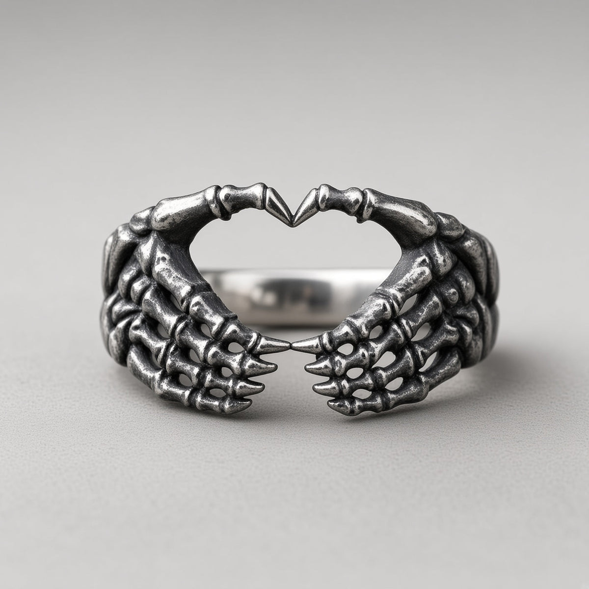 Skeletthände-Herz-Ring